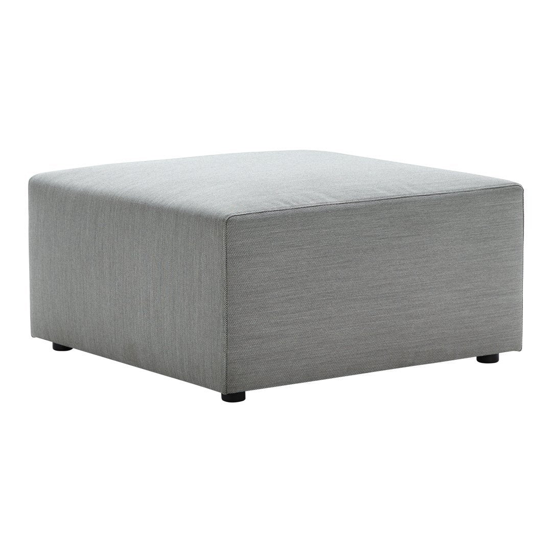 Gray square ottoman with a smooth, textured surface and minimalist design. Perfect for modern decor.