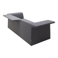 Modern grey sofa with a sleek, geometric design and minimalistic pattern, perfect for contemporary interiors.