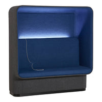Modern seating booth in dark gray with a vibrant blue interior and soft LED lighting. Stylish and cozy design.