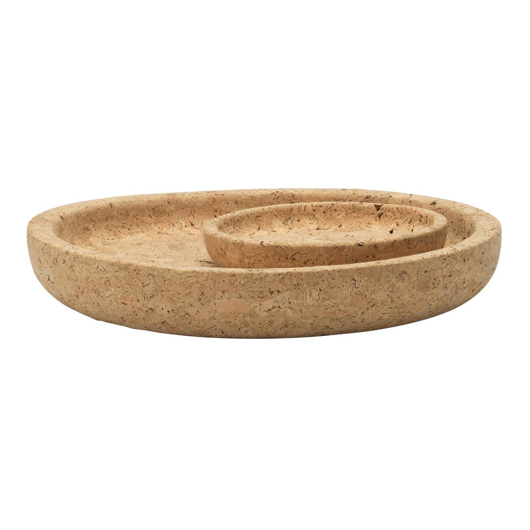 Natural cork serving trays in light beige with a smooth, minimalist design and circular patterns.