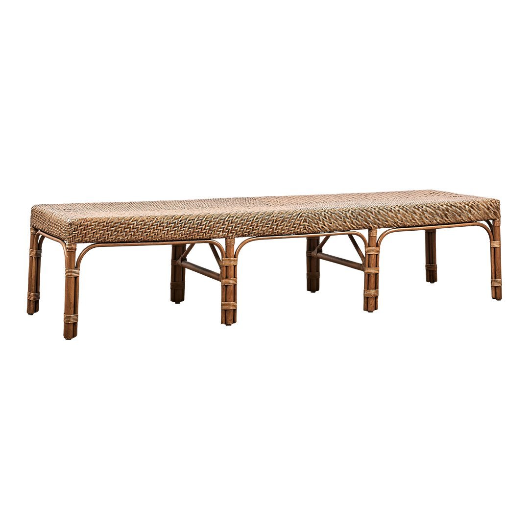 Natural woven rattan bench in warm brown tones with a sleek, minimalist design and intricate pattern.
