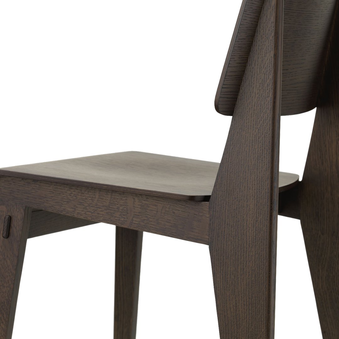 Dark wood chair with a sleek, minimalist design, showcasing rich brown tones and smooth, clean lines.