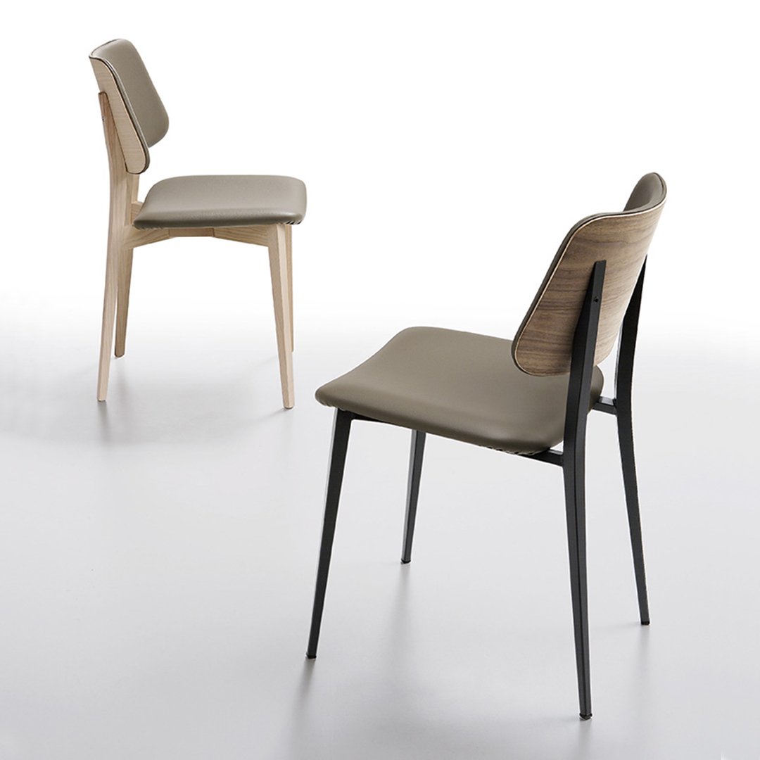 Two modern chairs, one natural wood and beige, the other black with a beige cushion, showcasing sleek, minimalist design.
