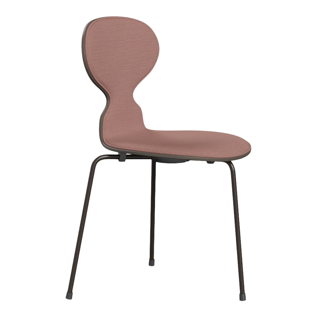 Minimalist chair featuring a soft rose pink seat and backrest, complemented by a sleek black metal frame.