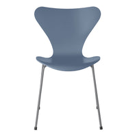 Blue modern chair with a sleek design and smooth finish, featuring a minimalist style and curved silhouette.