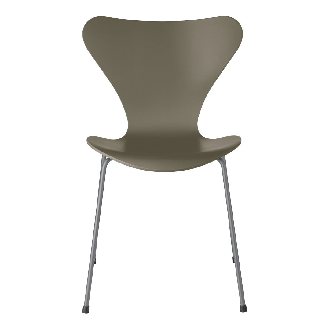 Olive green chair with a sleek, modern design and silver metal legs, showcasing a minimalist aesthetic.