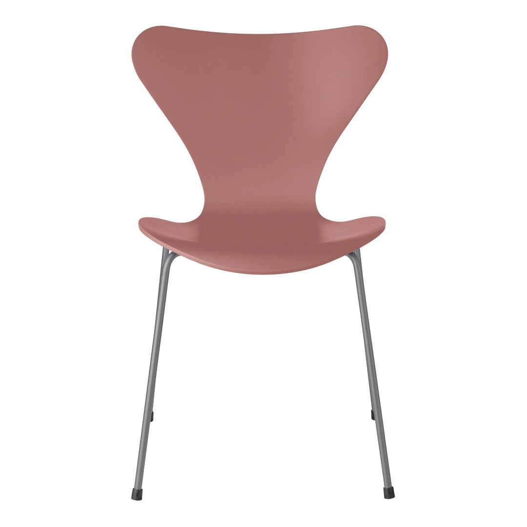 Dusty rose chair with a sleek, minimalist design and metal legs, perfect for modern decor.