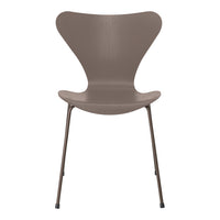 Modern brown chair with a stylish, minimalist design and smooth, curved lines ideal for any contemporary space.
