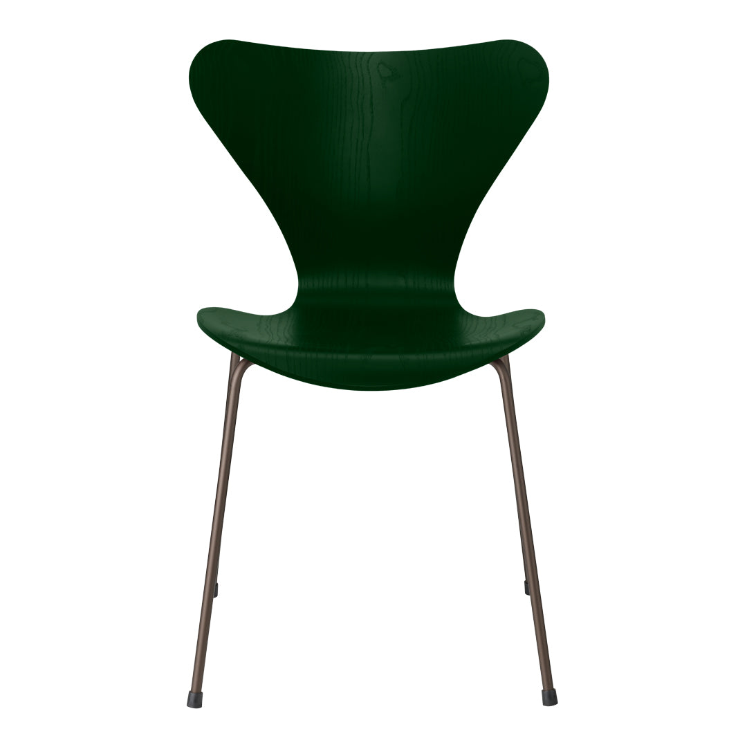 Green chair with an elegant butterfly shape and sleek metal legs, featuring a smooth, solid finish.