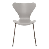 Elegant gray chair with a unique butterfly design and sleek, minimalist lines. Ideal for modern decor.