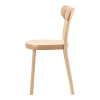 Light natural wood chair with a smooth, minimalist design and simple curved lines, showcasing a contemporary aesthetic.