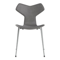 Stylish gray chair with a unique Y-shaped design and sleek metallic legs, perfect for modern decor.