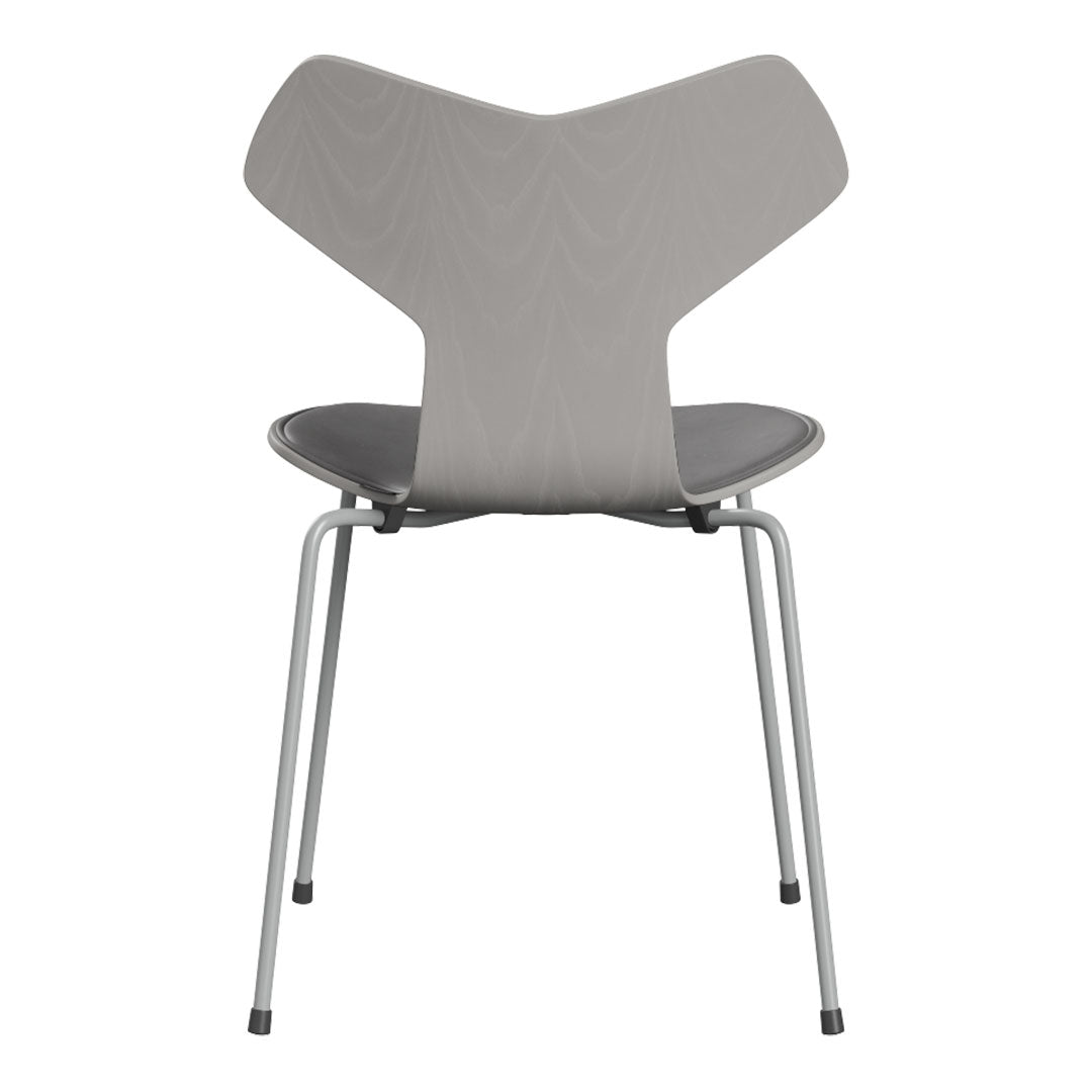 Gray minimalist chair with a unique three-part backrest and sleek silver legs. Modern design for any decor.
