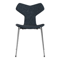 Modern chair with a sleek dark gray upholstered seat and shiny silver metal legs. Unique butterfly shape design.