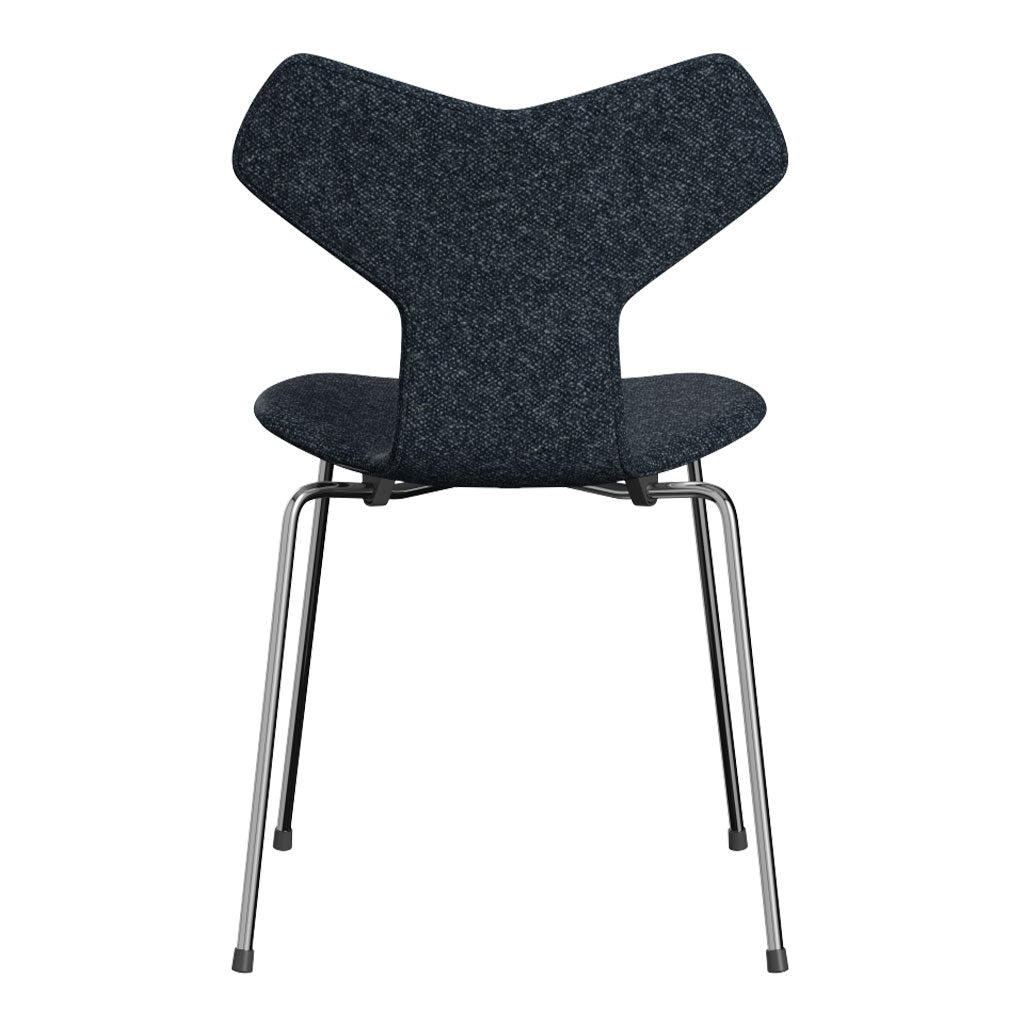 Dark gray upholstered chair with a unique, modern silhouette and sleek metal legs. Perfect for contemporary décor.