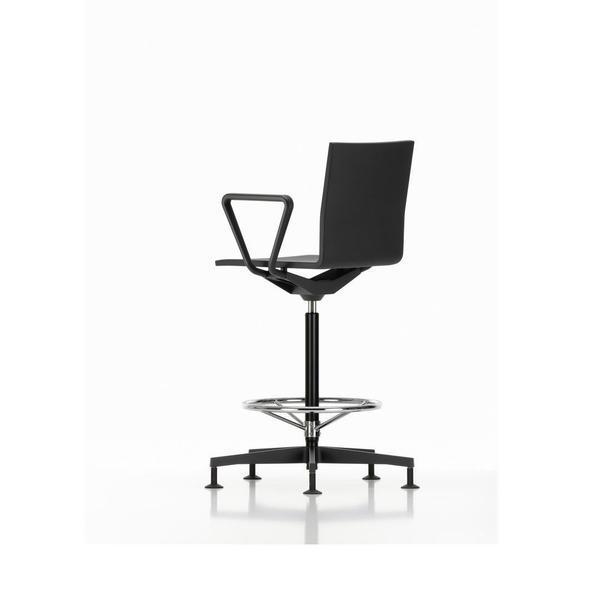Black ergonomic chair with a sleek design and minimalist pattern, featuring a chrome base and armrests.