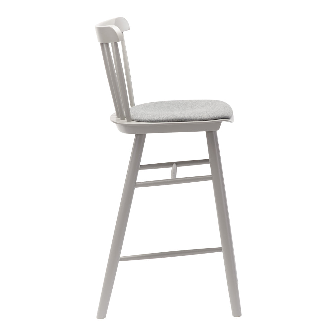Light gray bar stool with a soft, textured seat and clean, minimalist design. Perfect for modern interiors.