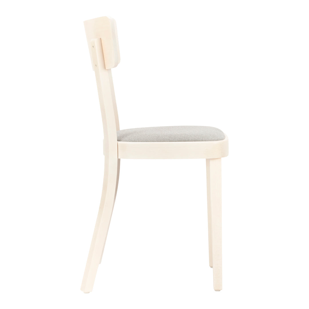 Light wood dining chair with a smooth gray seat, showcasing minimalist design and soft color palette.