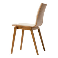 Light wood dining chair with a smooth, natural finish and a textured seat pattern in beige tones.