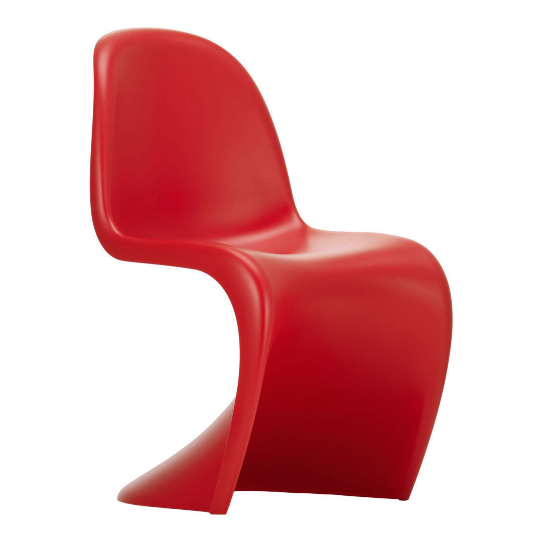 Vibrant red chair with a smooth, curvy design, perfect for adding a pop of color to any space.