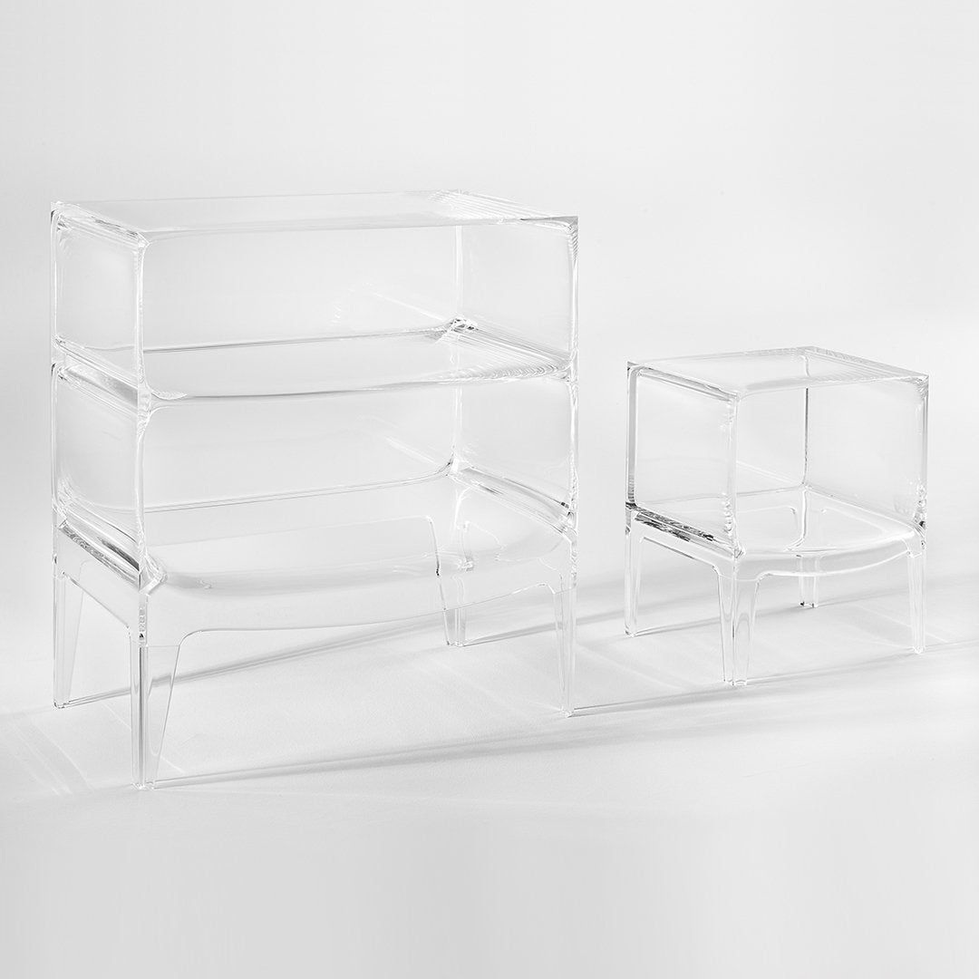 Clear acrylic storage units with a minimalist design, featuring clean lines and smooth surfaces. Perfect for modern decor.