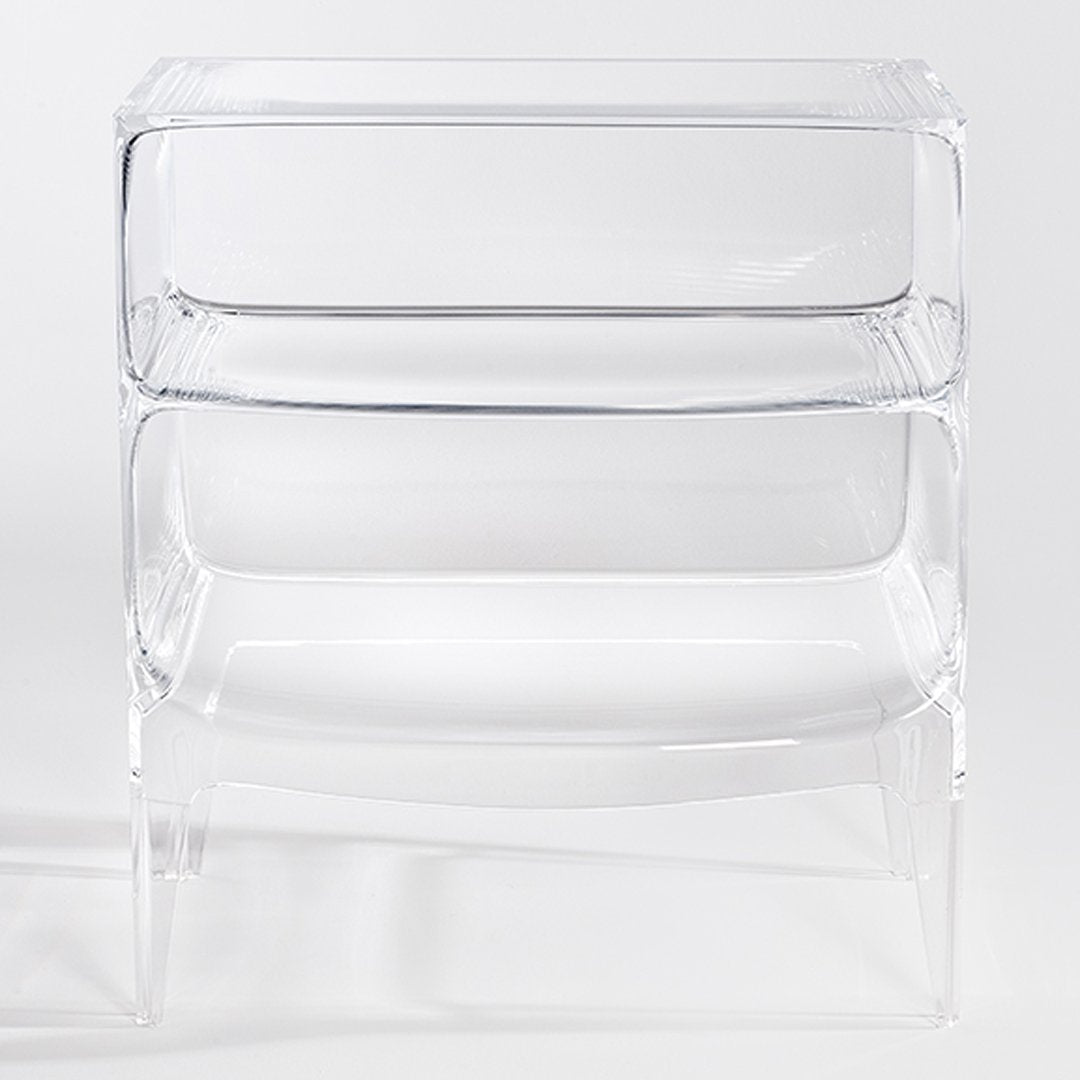 Clear acrylic nesting tables featuring a sleek, modern design with a minimalist pattern. Ideal for any decor.