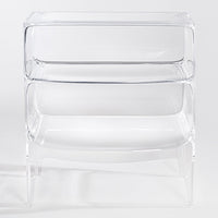 Clear acrylic nesting tables featuring a sleek, modern design with a minimalist pattern. Ideal for any decor.