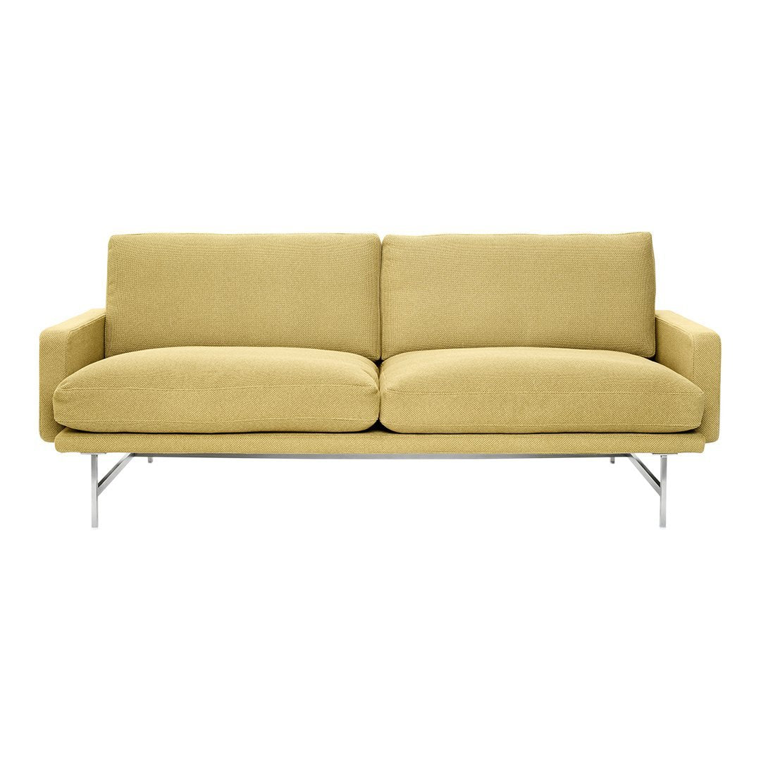 Modern yellow sofa with a sleek fabric texture and chrome legs, perfect for stylish living spaces.