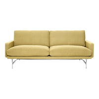 Modern yellow sofa with a sleek fabric texture and chrome legs, perfect for stylish living spaces.