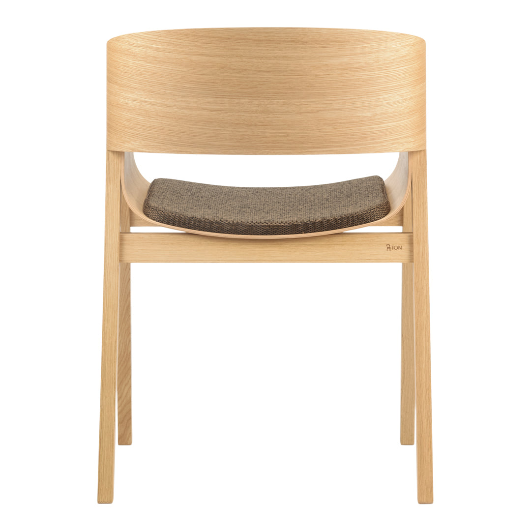 Light wood chair with a smooth, curved back and a dark gray fabric seat. Minimalist design, neutral color palette.