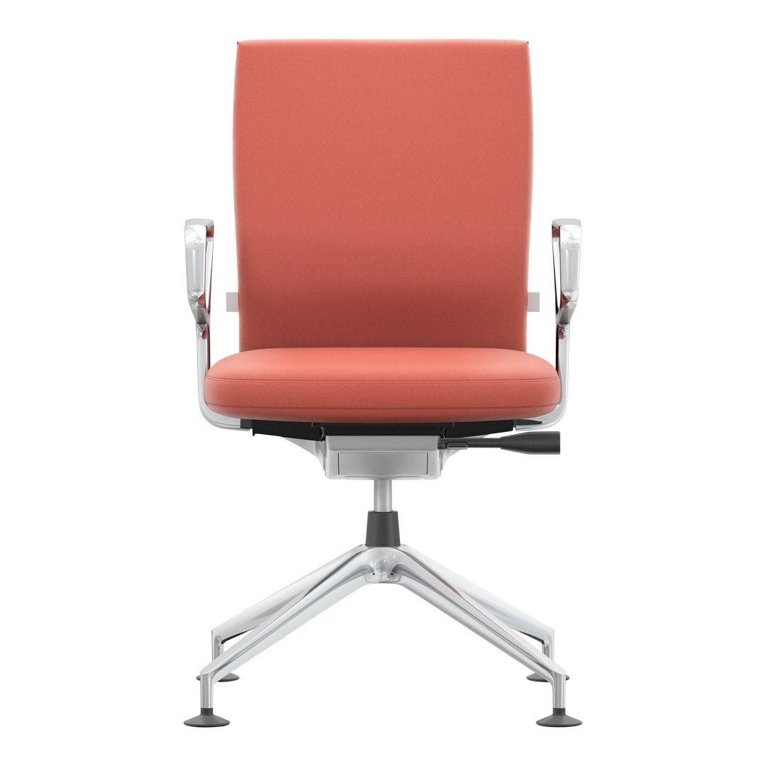 Coral-colored ergonomic chair with sleek chrome base and minimalist design, ideal for modern office spaces.