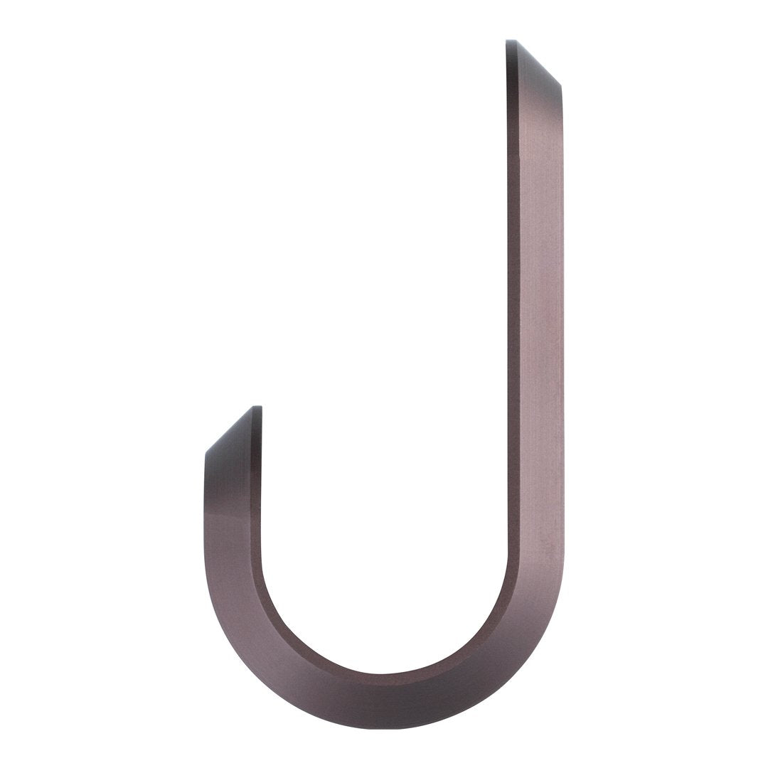 Sleek bronze metal hook with a minimalist design and smooth, curved edges. Ideal for modern decor.