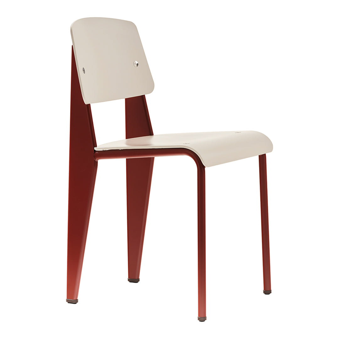 Red and cream chair with a modern design, featuring a solid color pattern and sleek lines. Ideal for contemporary spaces.