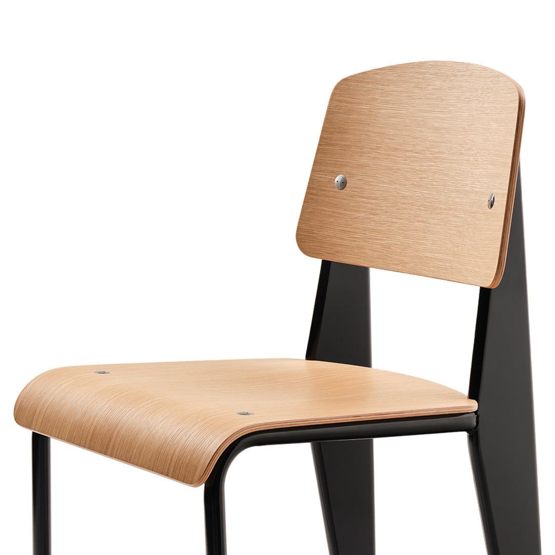 Natural wood finish with muted black accents, featuring a minimalist, curved design.