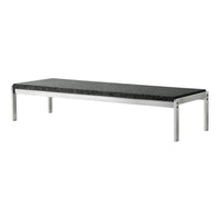 "Modern black stone tabletop with sleek silver legs, featuring a minimalist design."