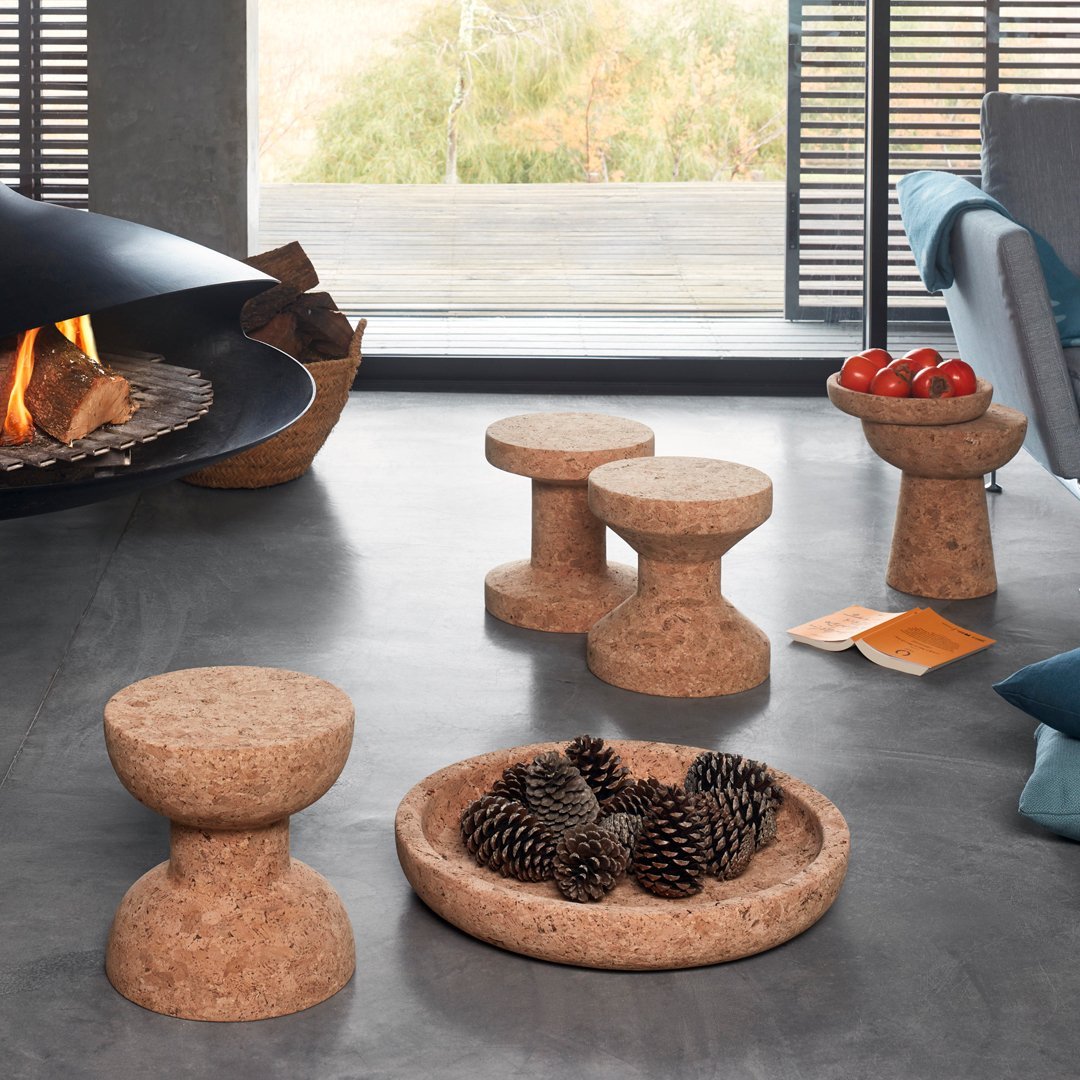 "Natural cork furniture set in earthy tones, featuring smooth surfaces and circular patterns for a modern look."
