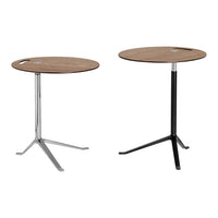 Two modern round side tables with walnut tops, one chrome base and one matte black base, featuring sleek minimalistic designs.