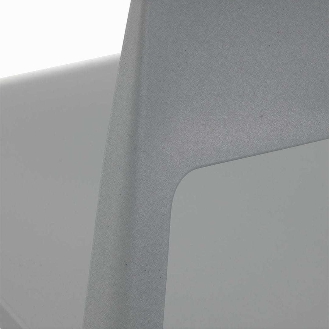 Gray textured surface with smooth edges, showcasing a modern minimalist design.