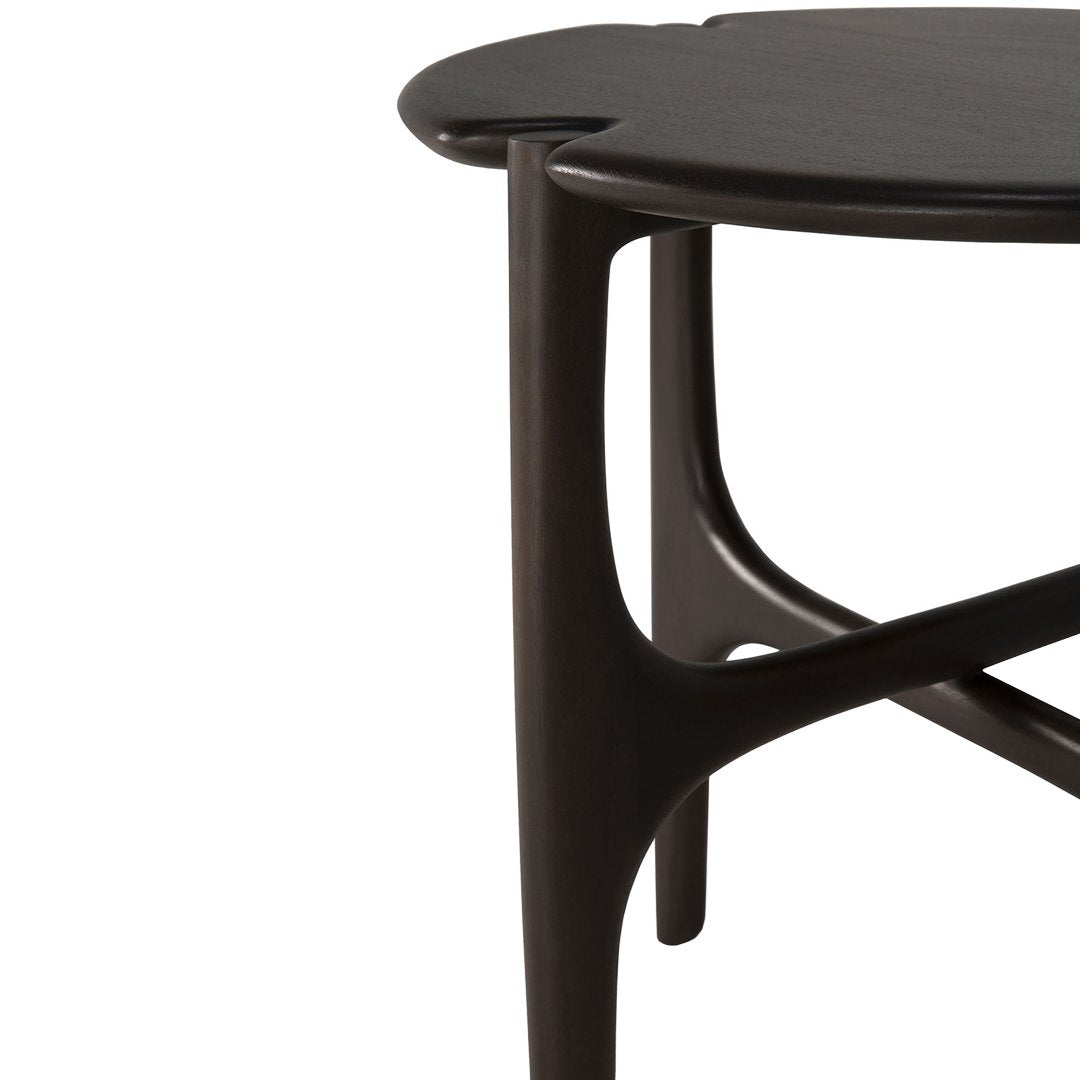 Dark wooden table with smooth, rounded edges and a sleek, minimalist design. Ideal for modern decor.