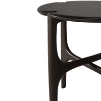 Dark wooden table with smooth, rounded edges and a sleek, minimalist design. Ideal for modern decor.