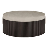Round ottoman with a soft beige top and dark brown pleated base, adding texture and elegance to any space.