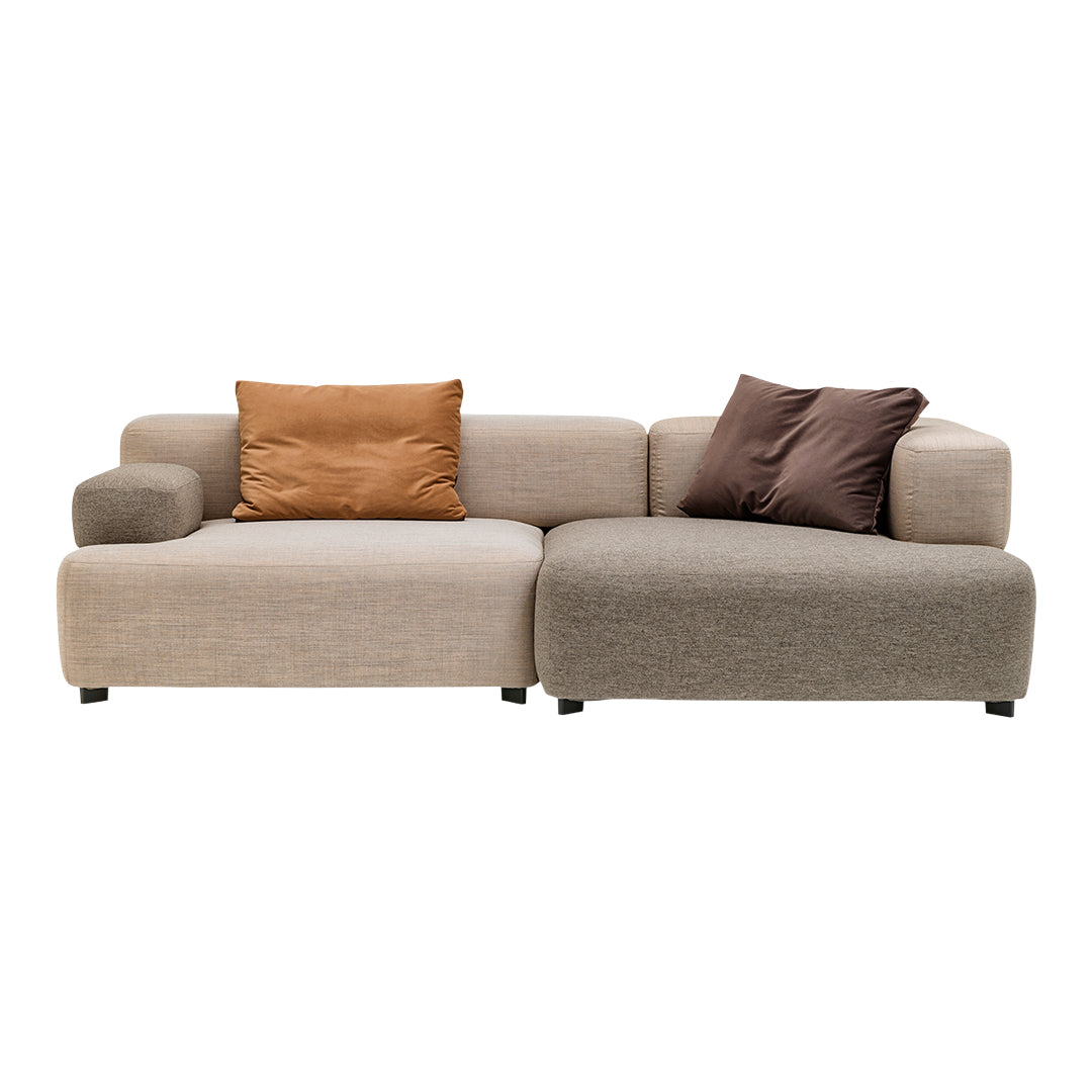Two-tone sectional sofa in beige and brown, featuring textured upholstery and plush cushions. Ideal for modern decor.