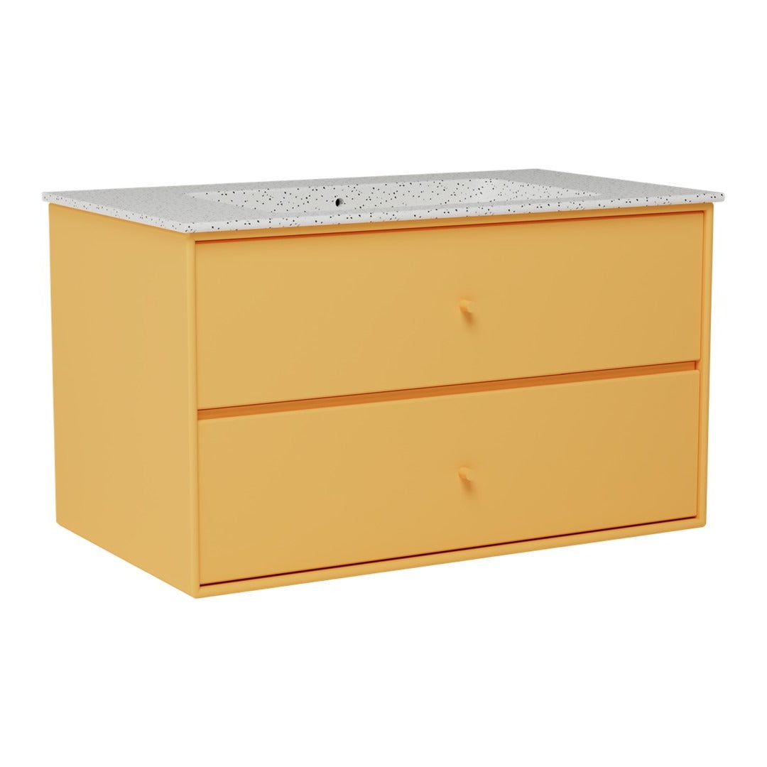 Orange storage cabinet with two drawers and a textured gray countertop. Modern design with a vibrant color palette.