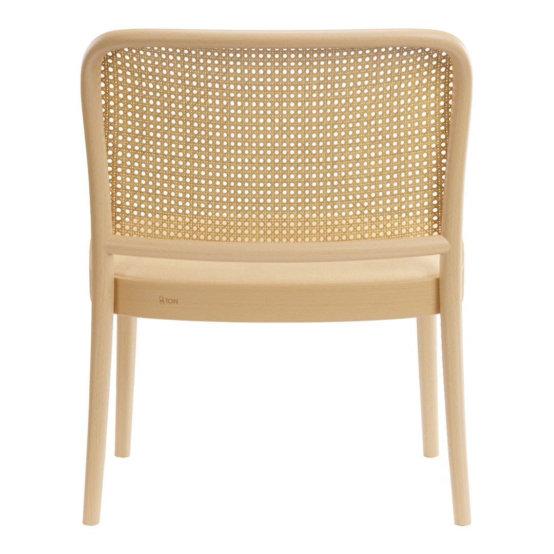 Light beige chair with a woven cane backrest, featuring a smooth, minimalist design. Ideal for modern decor.