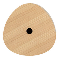 Natural light wood in a unique, rounded shape featuring a subtle grain pattern and a central black hole.