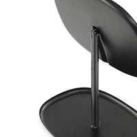 Black modern chair with a sleek, minimalist design and smooth, rounded edges. Perfect for contemporary spaces.