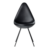 Modern black teardrop chair with sleek lines and black metal legs, perfect for contemporary decor.