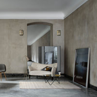 Modern living room with neutral beige tones, sleek patterns, and minimalist decor. Soft textures add warmth.