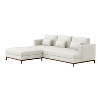 Modern white sectional sofa with plush cushions and sleek wooden base, featuring a minimalist design and clean lines.