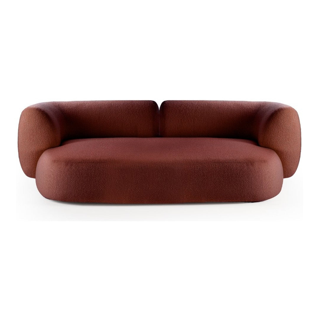 Brown sculptural sofa with rounded edges and a smooth, modern fabric texture. Ideal for contemporary living spaces.